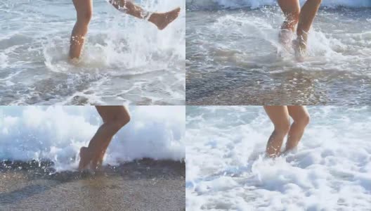 海滩上晒黑的女性腿。海水在沙滩上溅在脚上高清在线视频素材下载