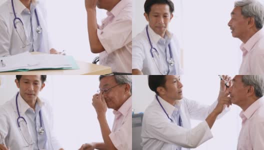 医生在医务室用手电筒检查老男病人的眼睛高清在线视频素材下载