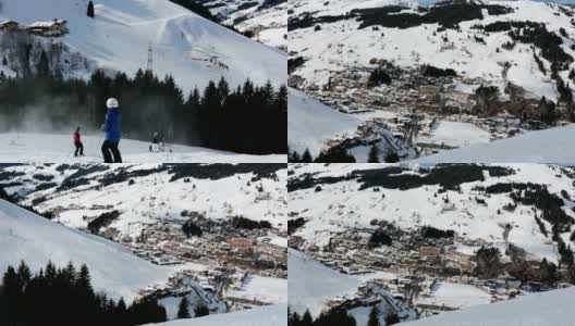 孩子在滑雪场观看救援行动，直升机从滑雪场接回伤者高清在线视频素材下载