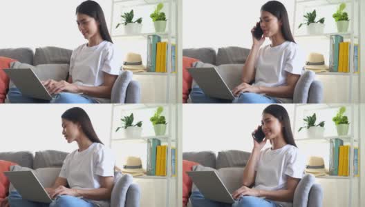 亚洲女性坐在家里用笔记本电脑工作，同时与客户交谈。高清在线视频素材下载