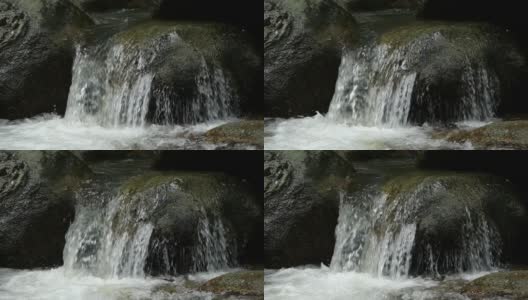 慢磨河流经泰国苏梅岛的岩石，欣拉德瀑布高清在线视频素材下载