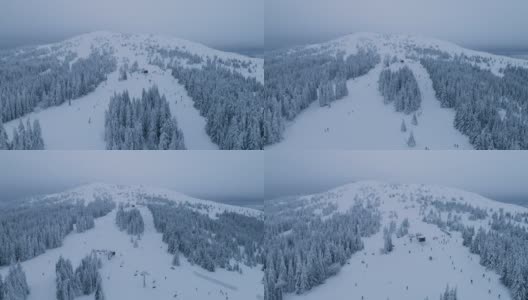 越过高山滑雪坡高清在线视频素材下载