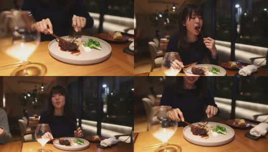 年轻女子在高级餐厅用餐高清在线视频素材下载