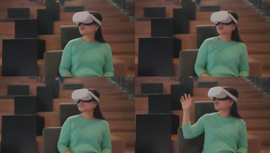 聪明迷人的亚洲女企业主戴着虚拟现实眼镜，在咖啡厅餐厅与专注于休闲的元时空会议，亚洲女企业主在咖啡厅使用oculus rift耳机高清在线视频素材下载