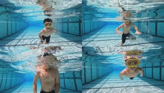 一个亚洲男孩在游泳池的水下玩耍和游泳高清在线视频素材下载
