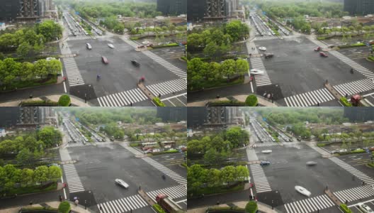 现代城市十字路口交通繁忙，延时和倾斜镜头。高清在线视频素材下载