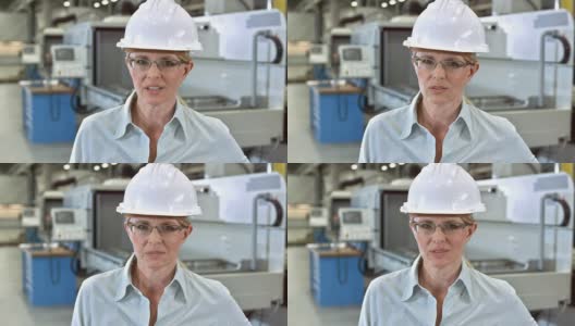 微软女商人正在工厂里召开视频会议高清在线视频素材下载