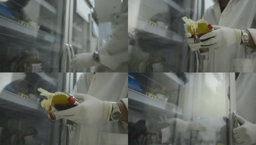 亚洲医疗技术员在实验室医院进行血袋冷藏期间的质量控制高清在线视频素材下载