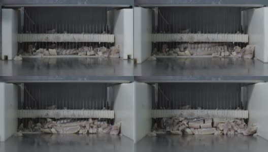 鱼类保存生产在工厂的切割机传送带高清在线视频素材下载