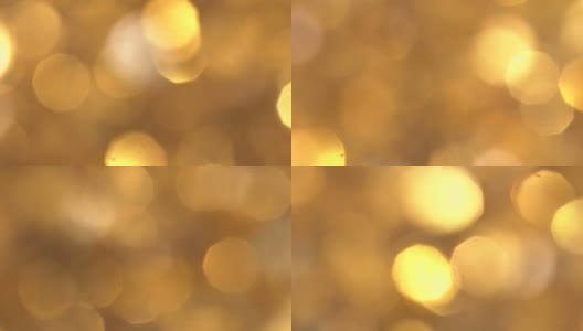 抽象的黄金散景灯在全高清视频中运动。高质量的黄金颗粒渲染。理想的圣诞节，情人节，婚礼，爱情，庆祝和派对视频的背景高清在线视频素材下载