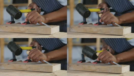 中间部分的木匠雕刻木材与锤子在桌子4k高清在线视频素材下载