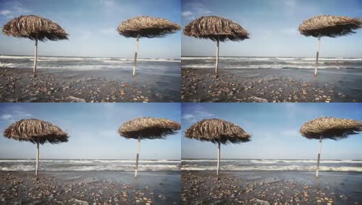 海边的草伞。高清在线视频素材下载