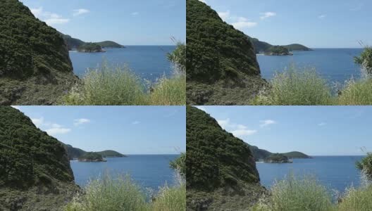 科孚岛(希腊)古奥卡斯特里萨海湾的鸟瞰图。海岸线周围的森林。清水。高清在线视频素材下载