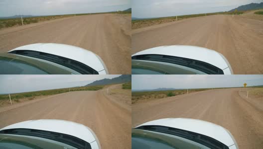 汽车前面的观点驾驶弯曲的沙漠道路高清在线视频素材下载