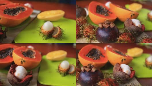 餐桌上有异国情调的热带水果。泰国的水果。特写镜头高清在线视频素材下载