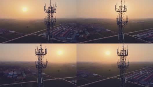 日落时5G蜂窝通信塔鸟瞰图高清在线视频素材下载