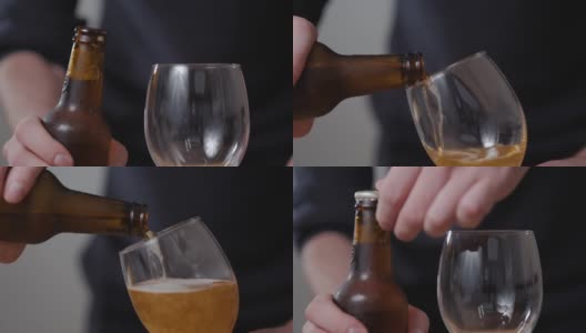 一瓶啤酒滴倒。关闭部分玻璃瓶玻璃手。开罐盖高清在线视频素材下载