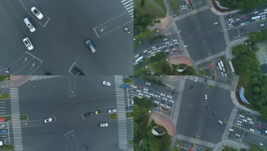 加速无人机旋转拍摄的城市十字路口，汽车和公交车行驶在大道上。在日落时高清在线视频素材下载