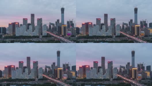 T/L PAN鸟瞰图北京CBD区域，黄昏到夜晚的过渡高清在线视频素材下载