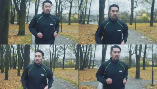日本人在雨天跑步(慢镜头)高清在线视频素材下载
