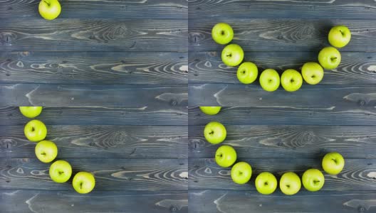 苹果微笑的延时动画。停止运动新鲜水果在木桌上，4K。概念牙科，健身，健康饮食。高清在线视频素材下载