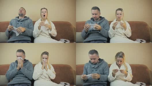 慢镜头:一个男孩和一个女孩坐在家里的沙发上打喷嚏，用手帕擦鼻涕。高清在线视频素材下载