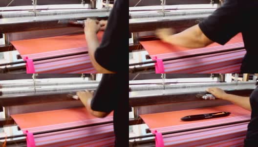 近距离的工人在木制编织线机制作传统泰国纺织丝绸制造高清在线视频素材下载
