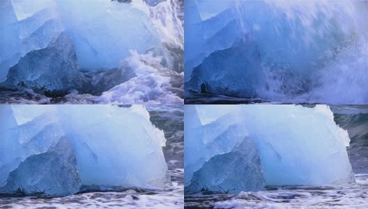 冰岛Jokulsarlon，深蓝色的冰川冰，海浪拍打着海岸高清在线视频素材下载