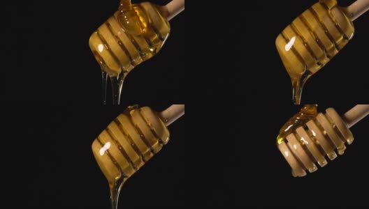 (慢镜头)蜂蜜从一个带有拷贝空间的木制蜂蜜勺中流出高清在线视频素材下载