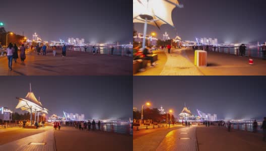 夜光照亮青岛著名的拥挤的步行湾pov全景时间流逝4k中国高清在线视频素材下载