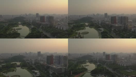 日落时分佛山市中心著名公园滨江湾高空俯仰全景4k中国高清在线视频素材下载