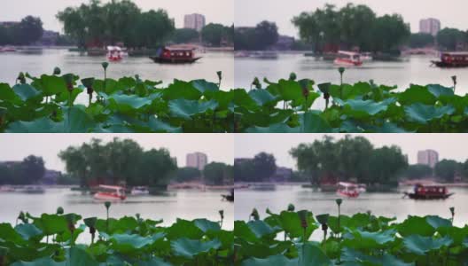 传统的中国船在著名的北京前海湖，一个受家庭和游客欢迎的目的地高清在线视频素材下载