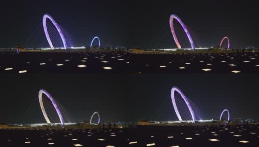 夜光时分，照亮了南京市内著名的现代步行眼桥，江边广场全景4k中国高清在线视频素材下载
